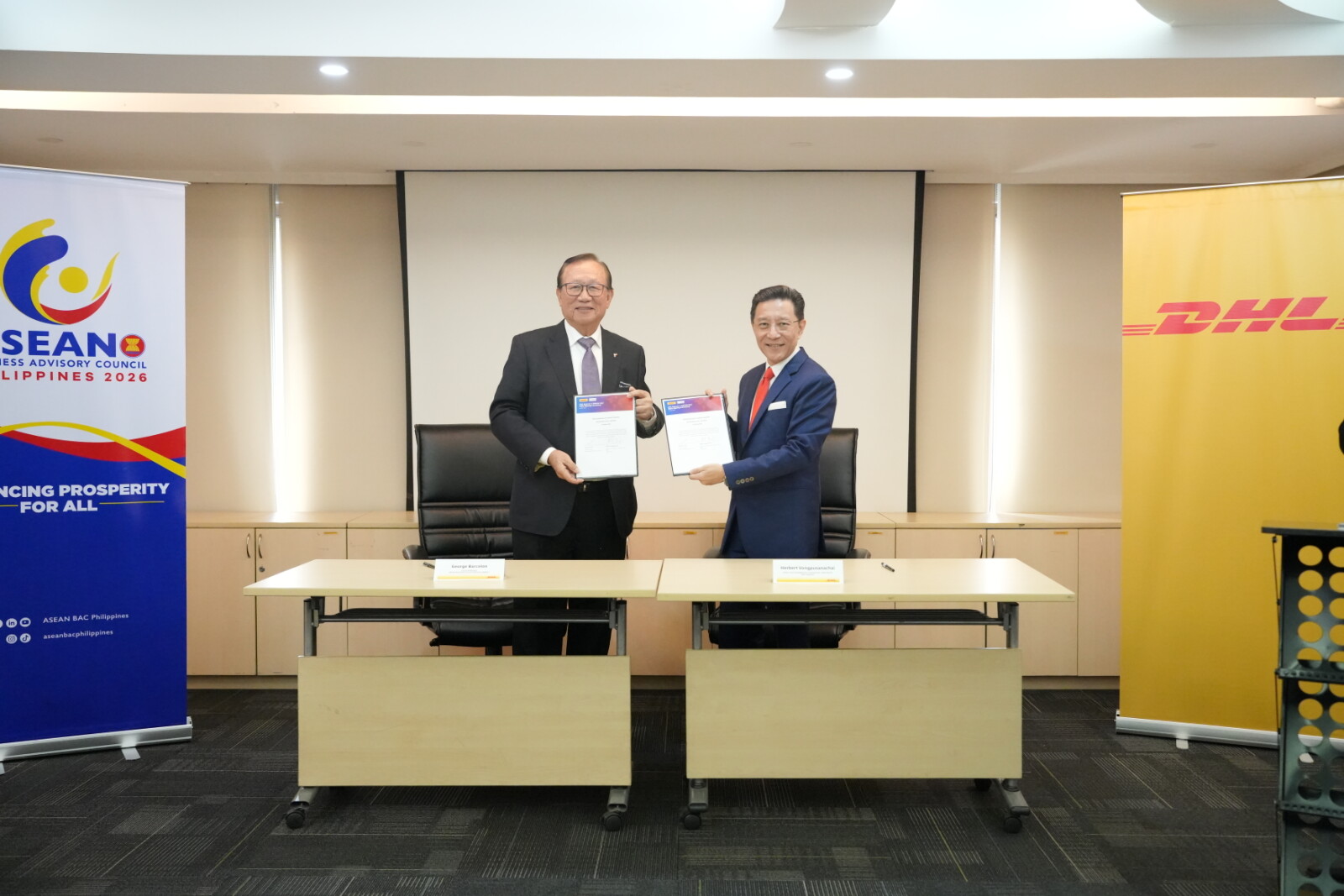 George Barcelon, Council Member, ASEAN Business Advisory Council and Herbert Vongpusanachai, Senior Vice President - Commercial for Asia Pacific, DHL Express signed the MoU in Manila