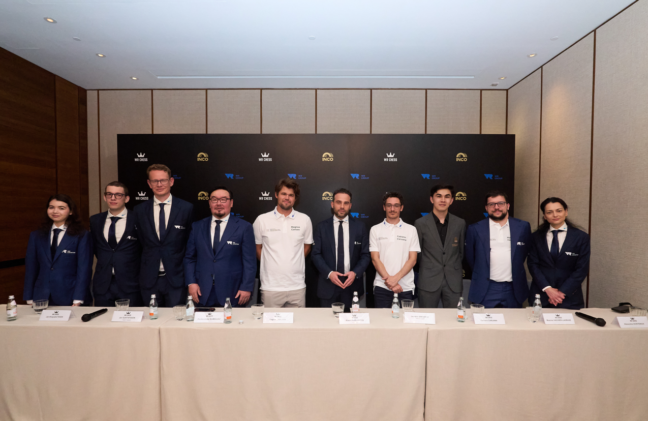 (From left) Alexandra Goryachkina, Jan-Krzysztof Duda, Jan Gustafsson, H.E. Mr Zandanshatar Gombojav, Magnus Carlsen, Wadim Rosenstein, Fabiano Caruana, special guest Javokhir Sindarov, Maxime Vachier-Lagrave, and Alexandra Kosteniuk during the WR Chess' team press conference in Hong Kong, 16 June 2026.