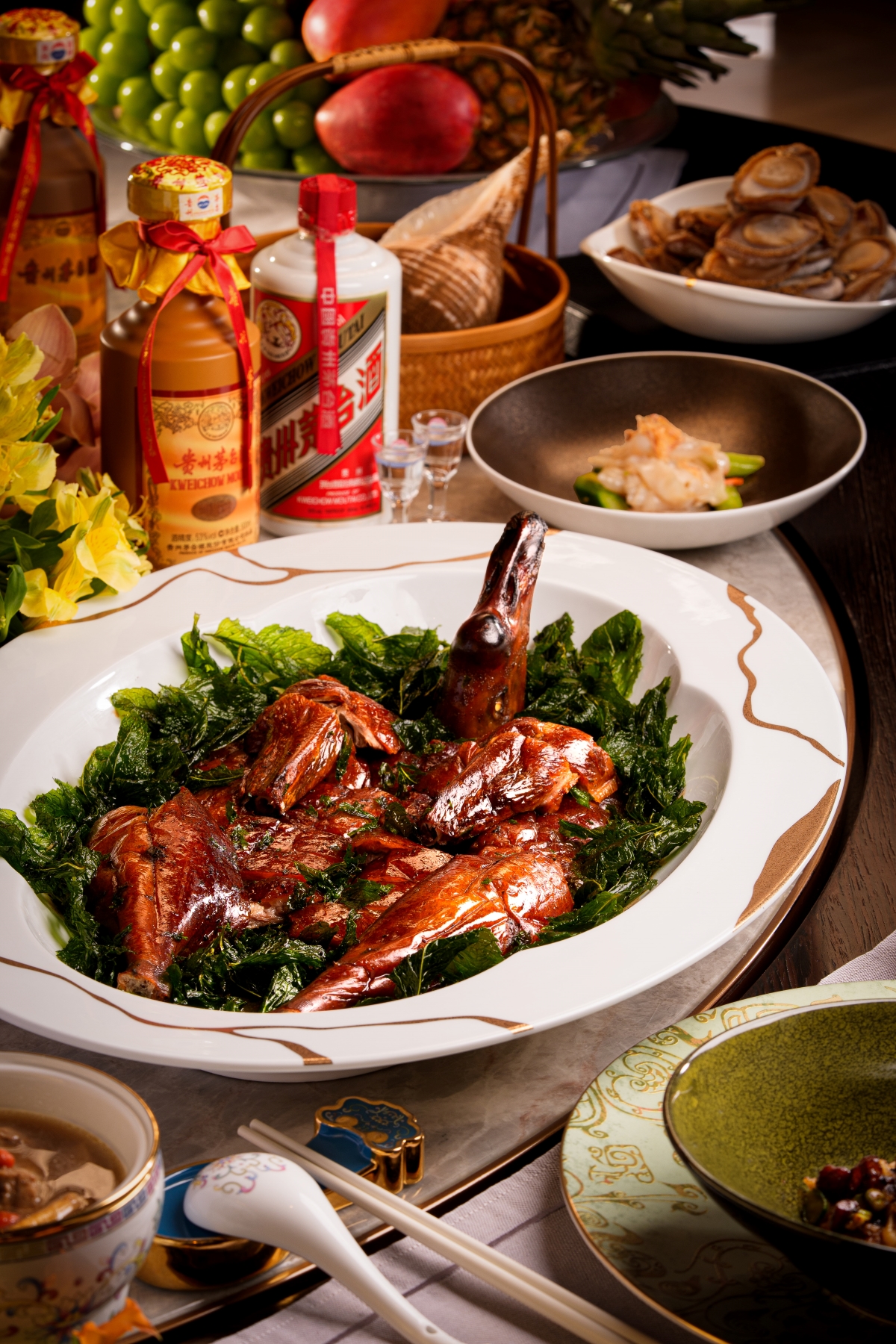 Roasted Goose with Fermented Black Bean and Mint alongside House of Origin Abalone infused with Moutai aromas, thoughtfully paired with rare aged Moutai, celebrating the timeless artistry and elegance of Cantonese gastronomy at "A Journey of Craft and Time – 15-Year Moutai Pairing Dinner presented by House of Origin Masters"